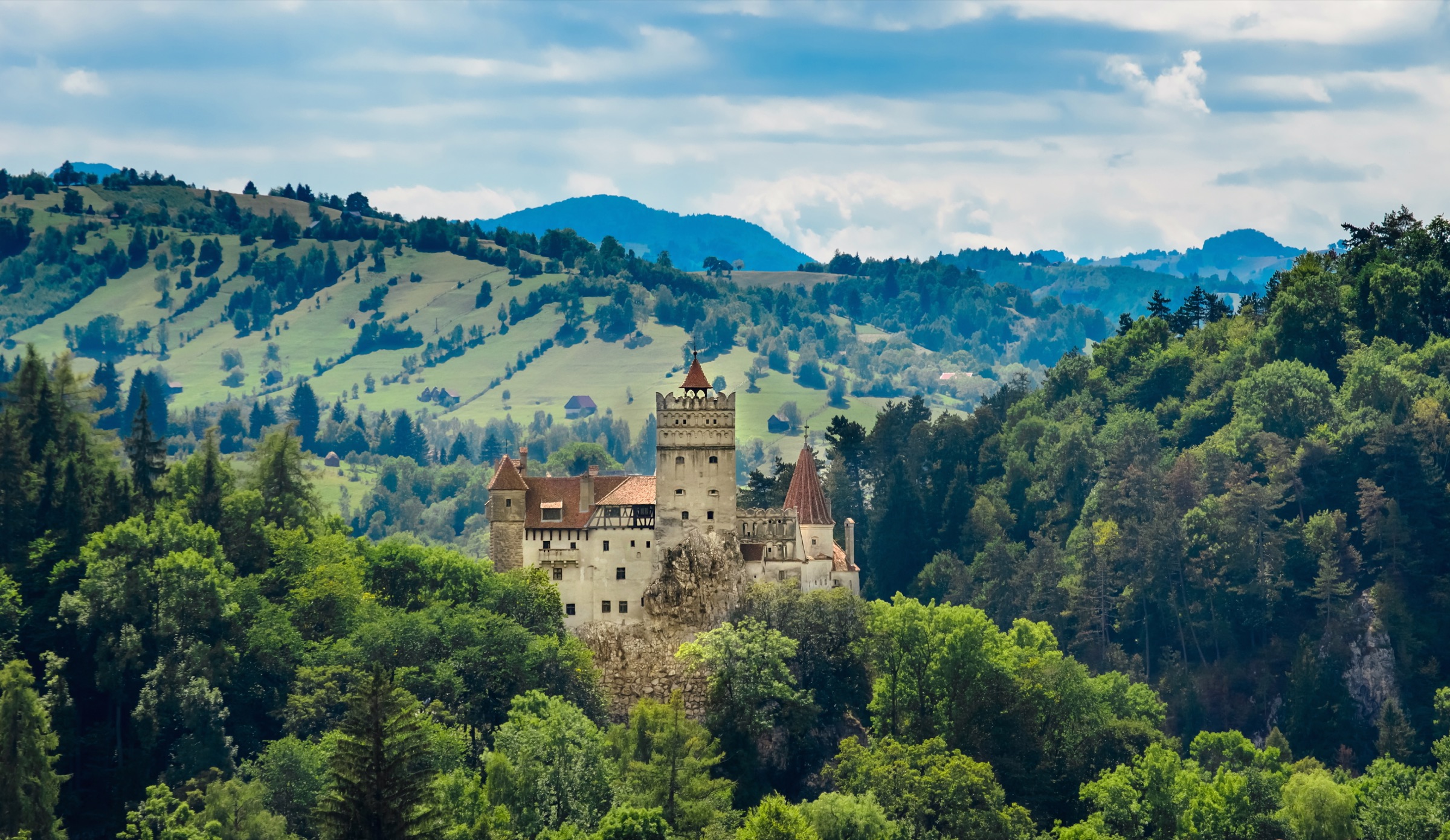 Bran Castle above the Transylvanian forest